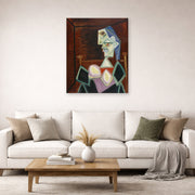 Unframed poster print of Pablo Picasso's 'Profile of a Woman With Blue Hair' displayed on a wall in a living room