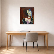 Unframed poster print of Pablo Picasso's 'Profile of a Woman With Blue Hair' displayed on a wall in a home office