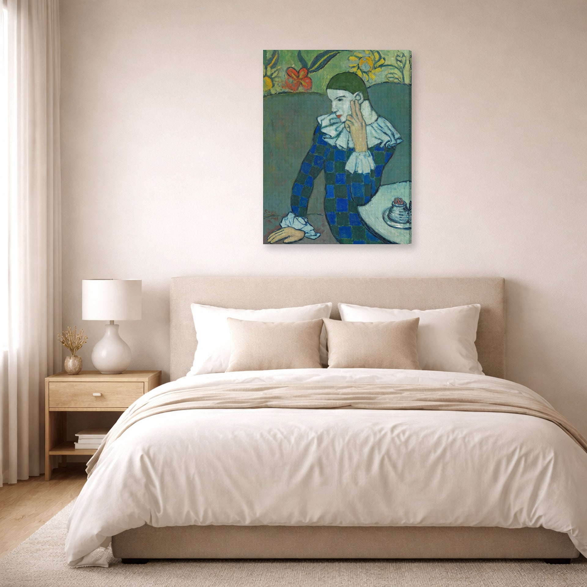 Gallery-wrapped canvas print of Pablo Picasso's 'Seated Harlequin' displayed on a wall in a bedroom