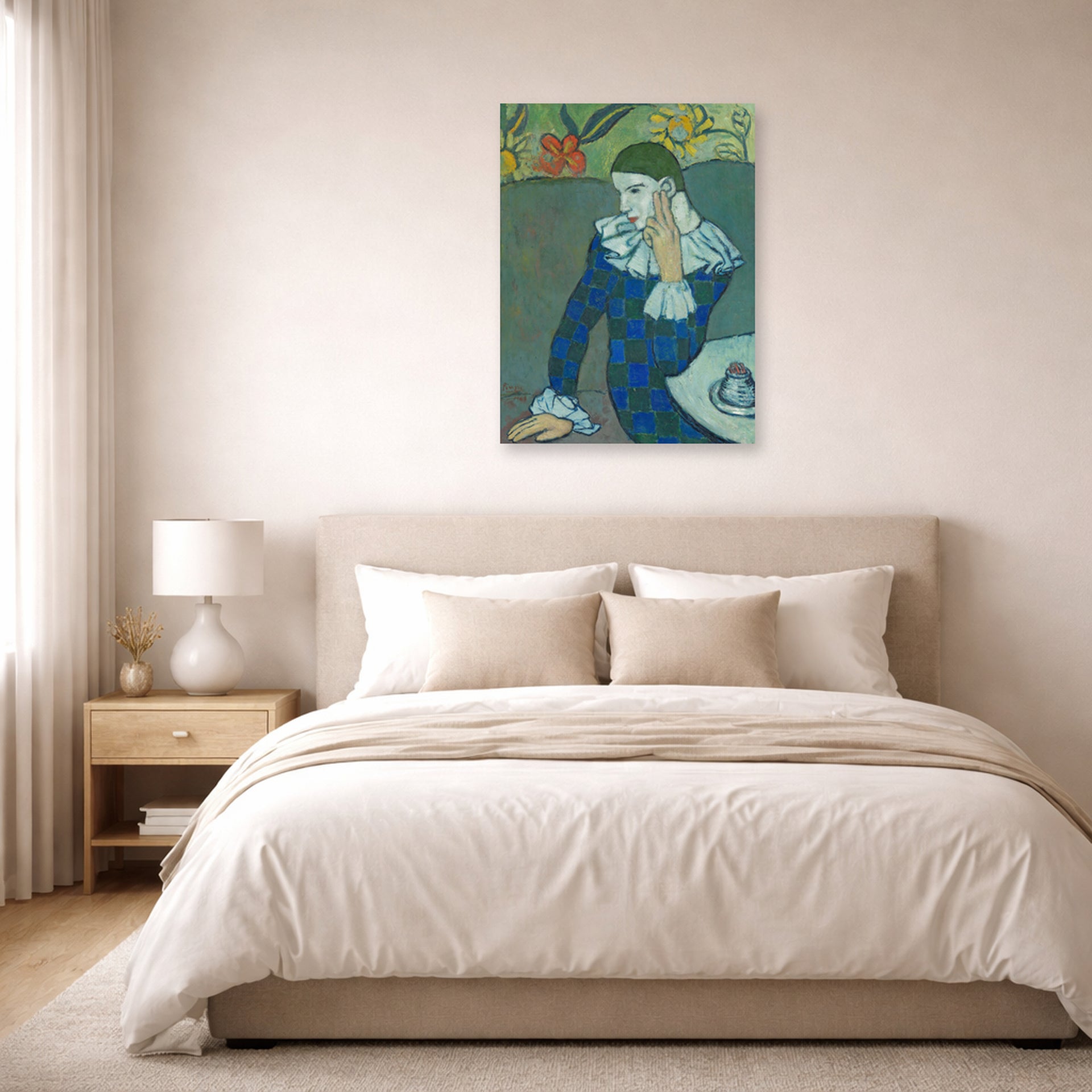 Unframed poster print of Pablo Picasso's 'Seated Harlequin' displayed on a wall in a bedroom
