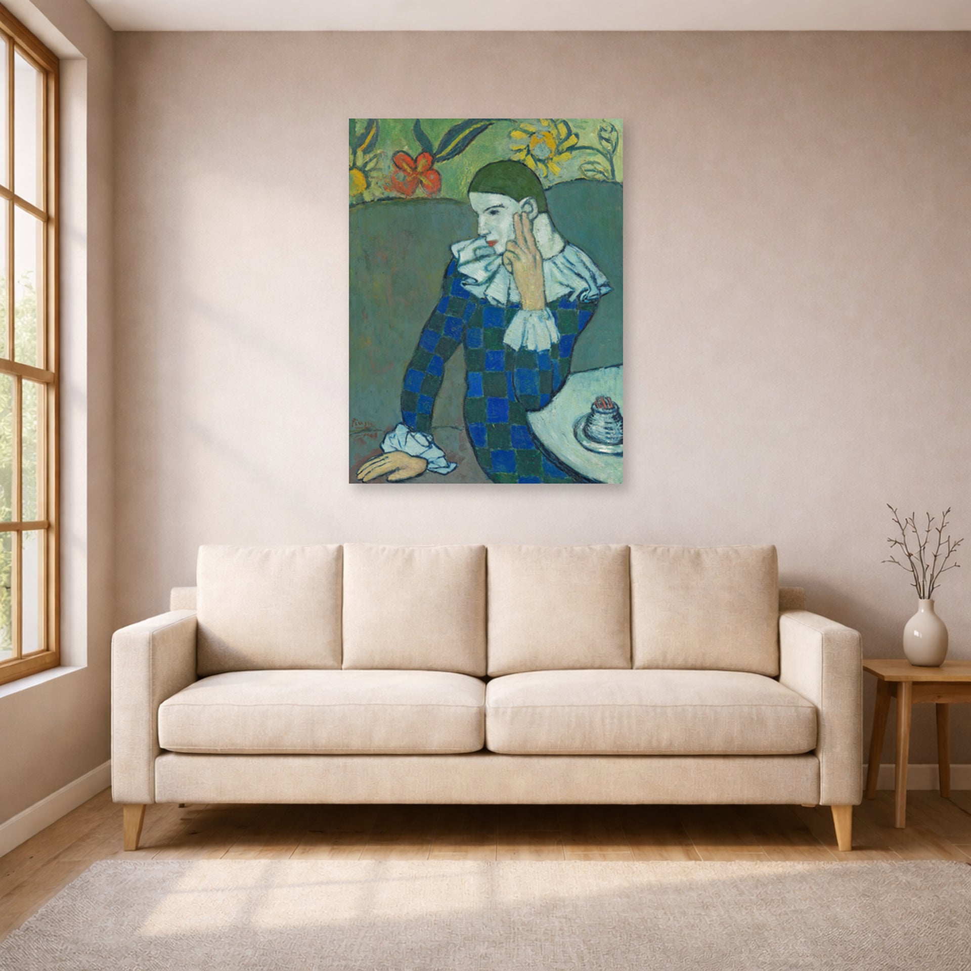 Unframed poster print of Pablo Picasso's 'Seated Harlequin' displayed on a wall in a living room