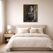 Gallery-wrapped canvas print of Pablo Picasso's 'Seated Woman' displayed on a wall in a bedroom