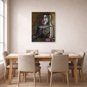 Unframed poster print of Pablo Picasso's 'Seated Woman' displayed on a wall in a dining room
