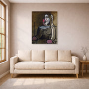 Unframed poster print of Pablo Picasso's 'Seated Woman' displayed on a wall in a living room