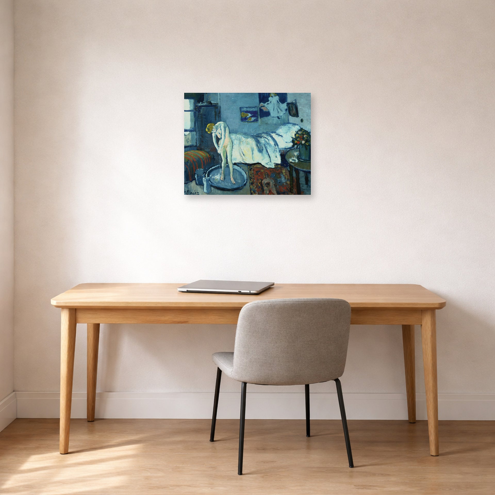 Unframed poster print of Pablo Picasso's 'The Bath Tab' displayed on a wall in a home office