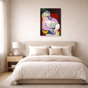 Unframed poster print of Pablo Picasso's 'The Dream' displayed on a wall in a bedroom
