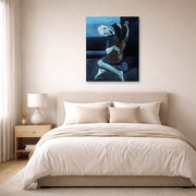Gallery-wrapped canvas print of Pablo Picasso's 'The Old Guitarist' displayed on a wall in a bedroom