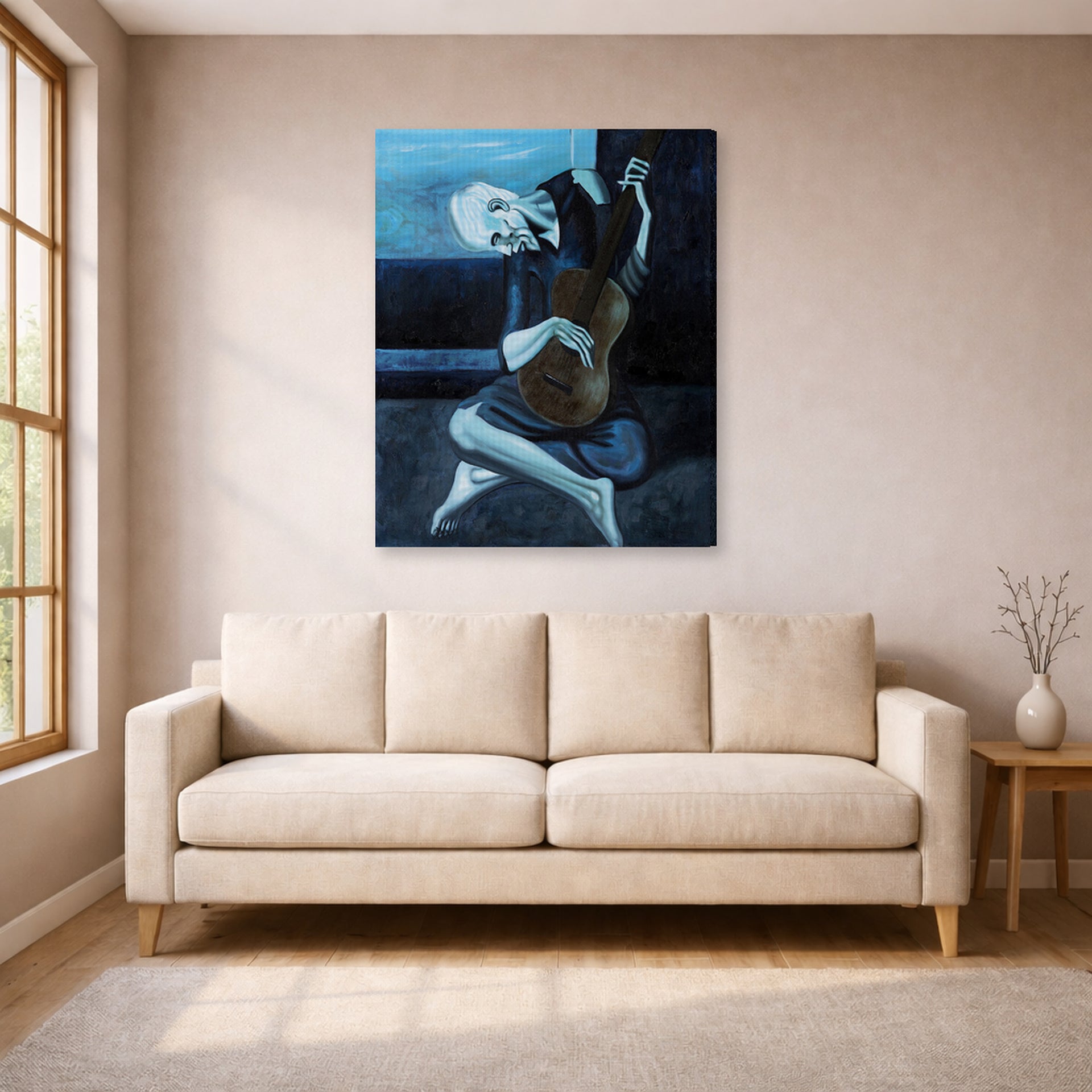 Gallery-wrapped canvas print of Pablo Picasso's 'The Old Guitarist' displayed on a wall in a living room