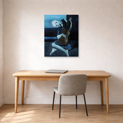 Gallery-wrapped canvas print of Pablo Picasso's 'The Old Guitarist' displayed on a wall in a home office