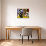 Unframed poster print of Pablo Picasso's 'The Painter and The Model' displayed on a wall in a home office