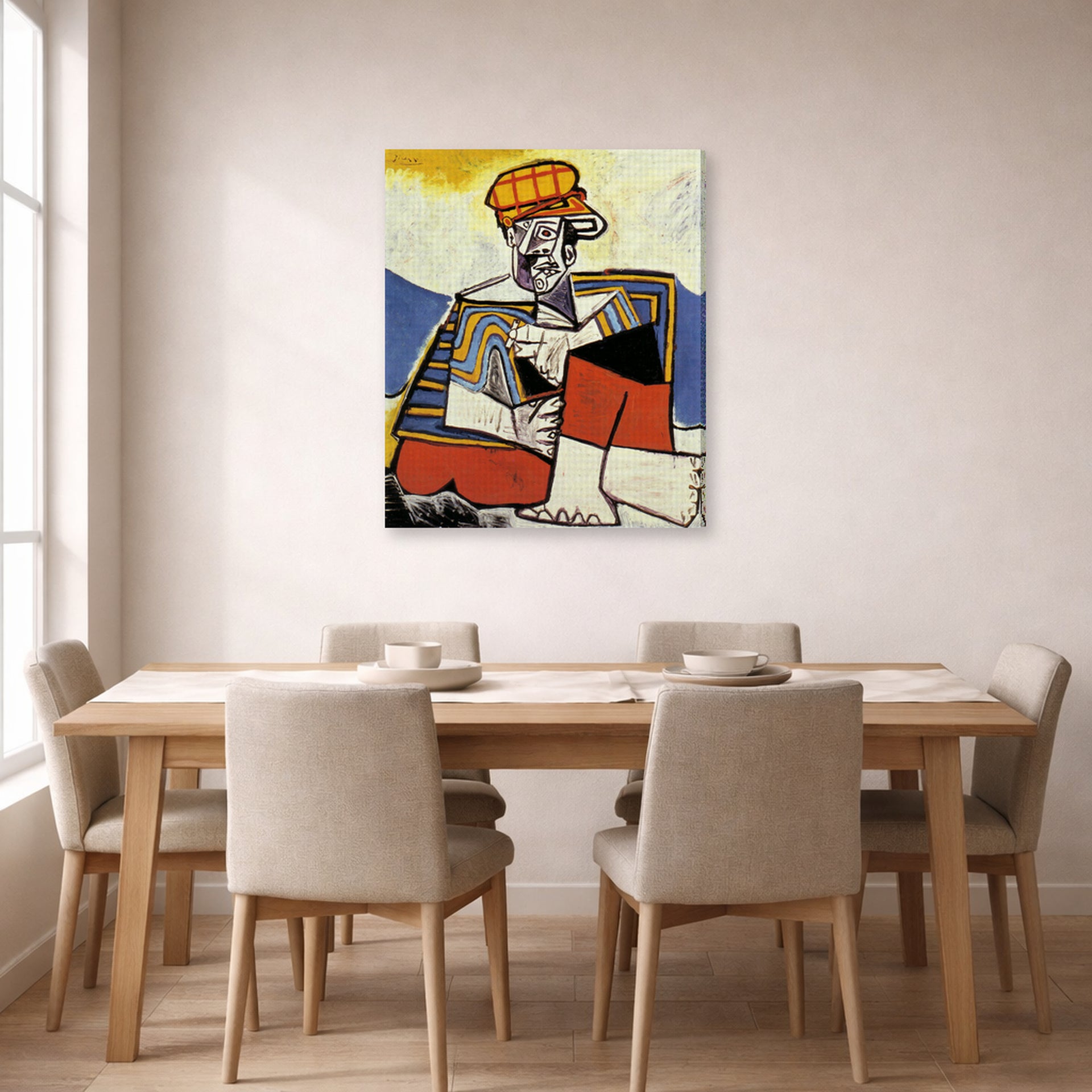 Gallery-wrapped canvas print of Pablo Picasso's 'The Smoker' displayed on a wall in a dining room