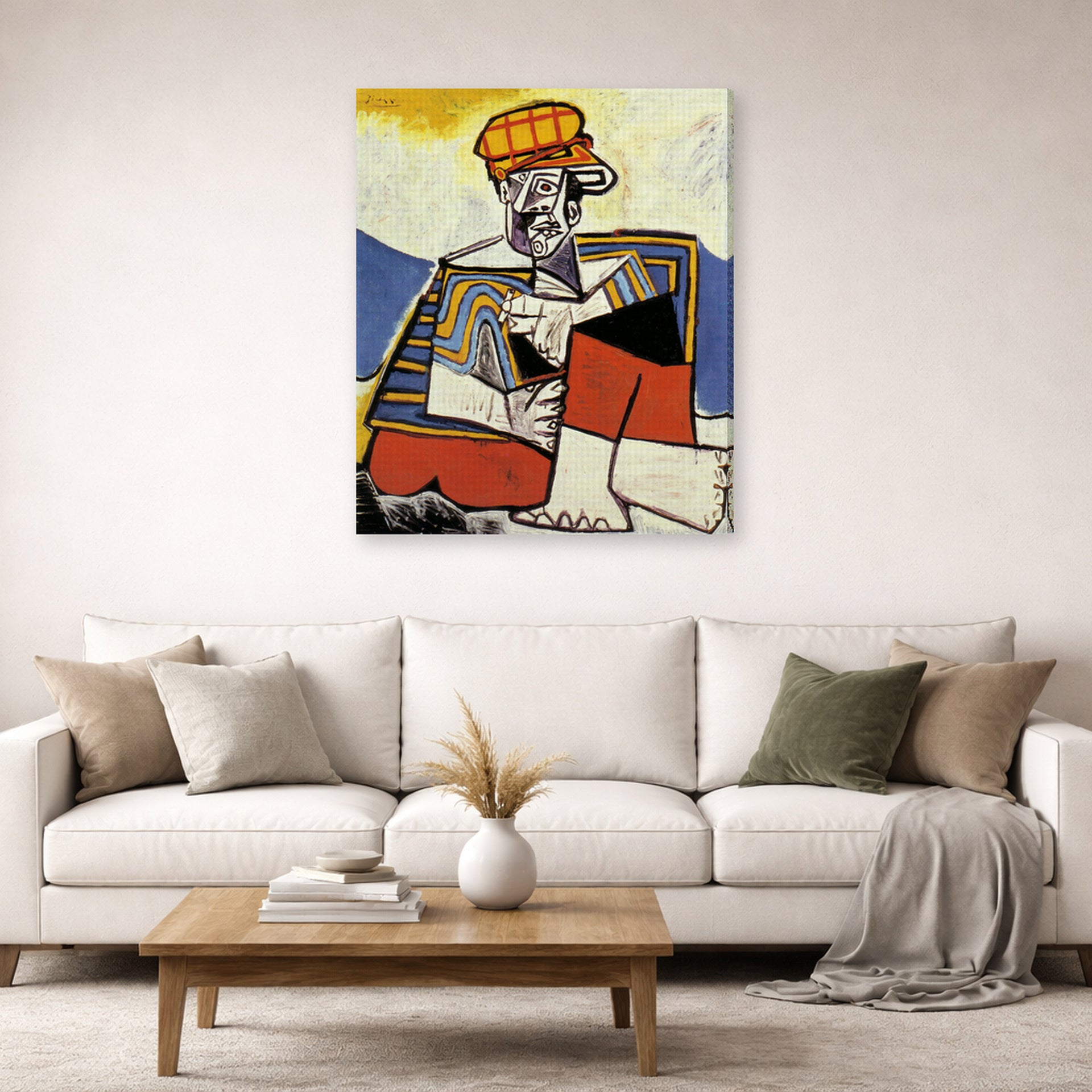 Gallery-wrapped canvas print of Pablo Picasso's 'The Smoker' displayed on a wall in a living room