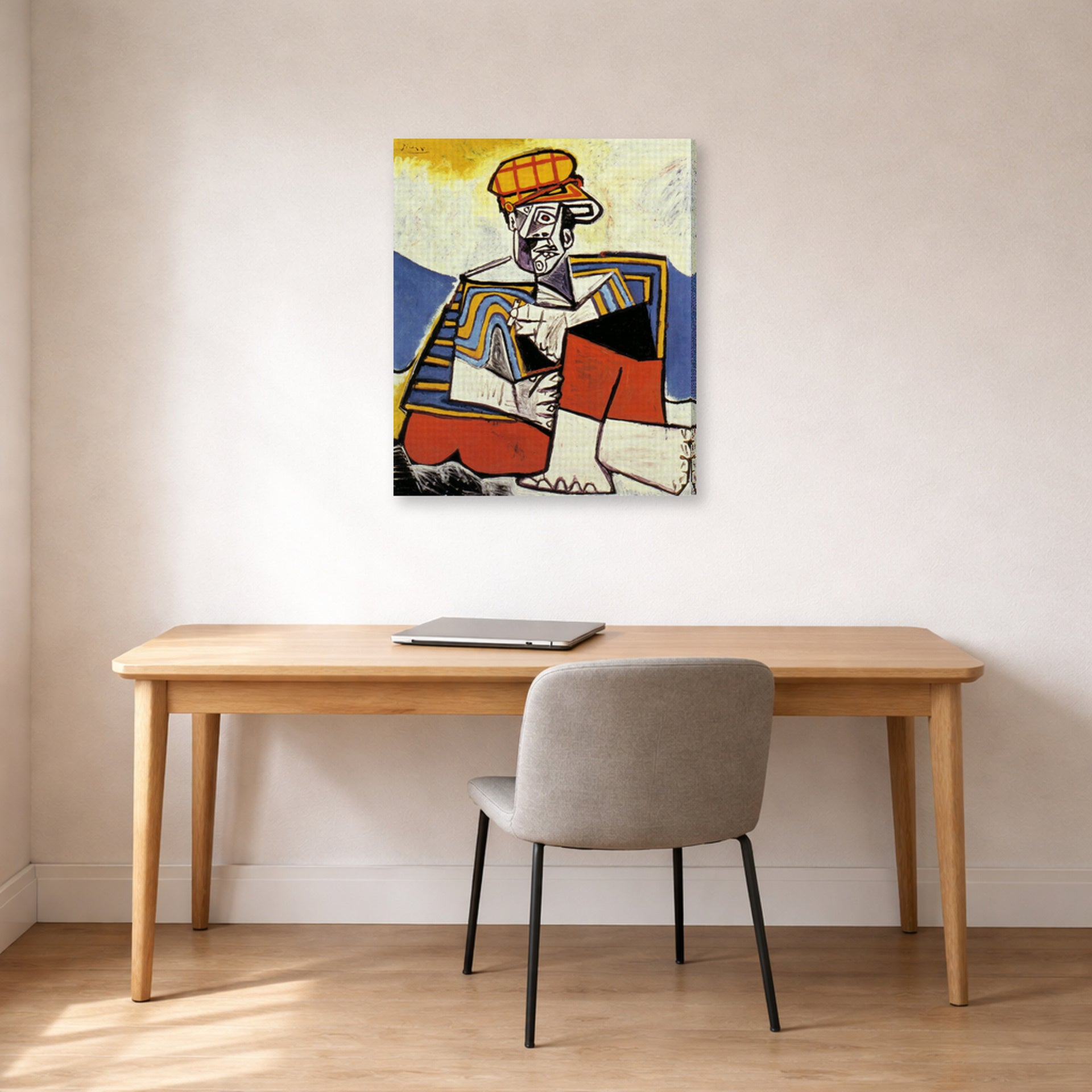 Gallery-wrapped canvas print of Pablo Picasso's 'The Smoker' displayed on a wall in a home office