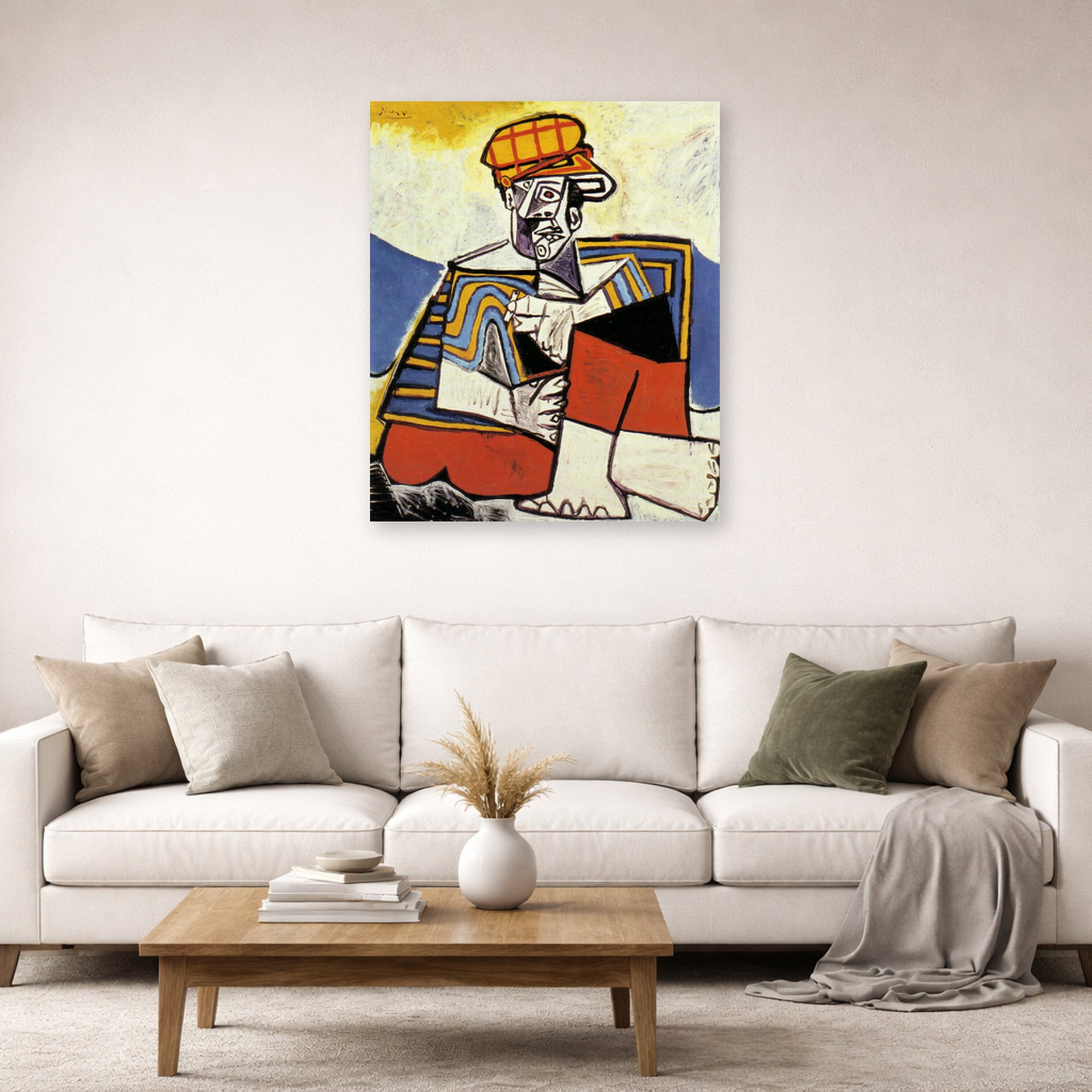 Unframed poster print of Pablo Picasso's 'The Smoker' displayed on a wall in a living room