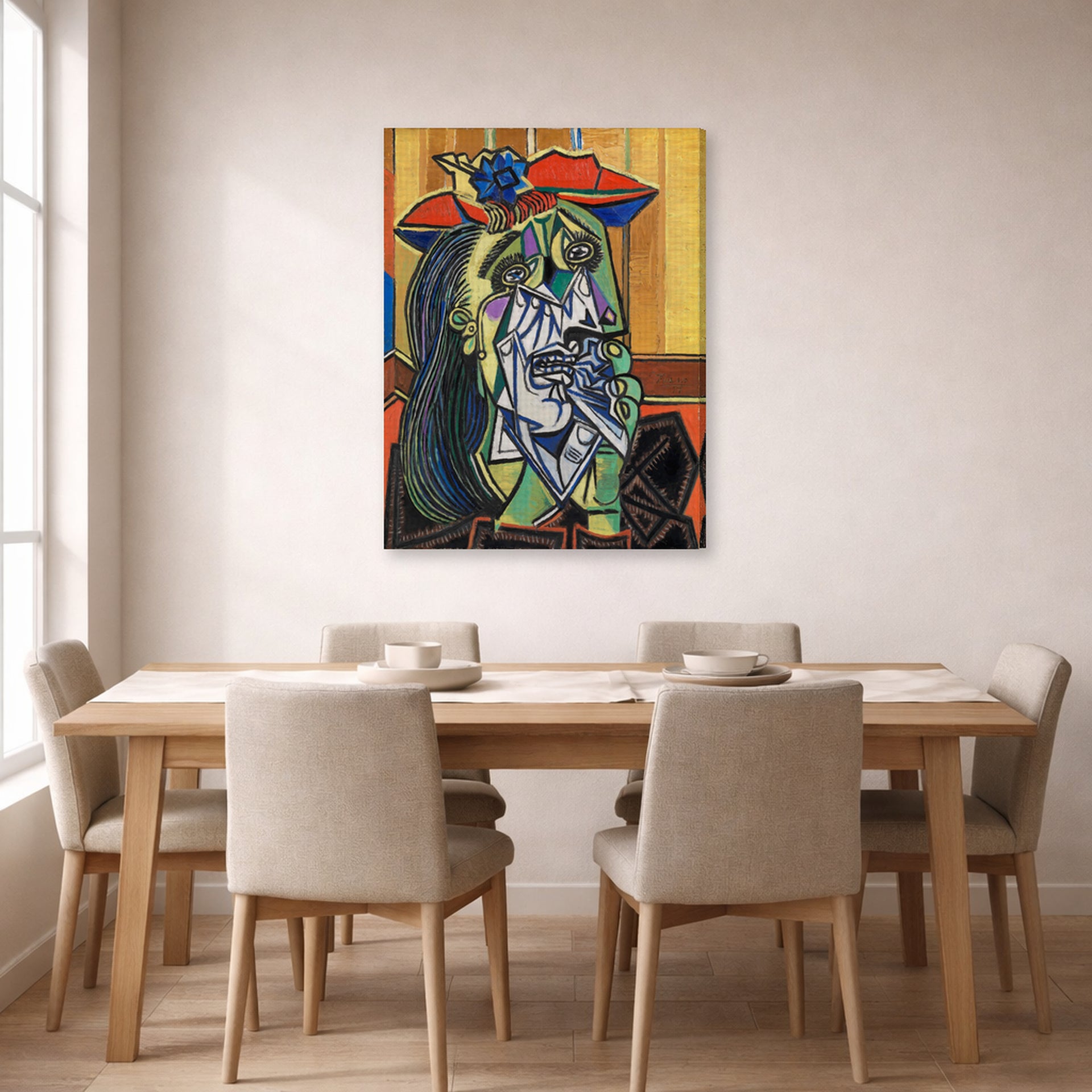 Gallery-wrapped canvas print of Pablo Picasso's 'Weeping Woman' displayed on a wall in a dining room