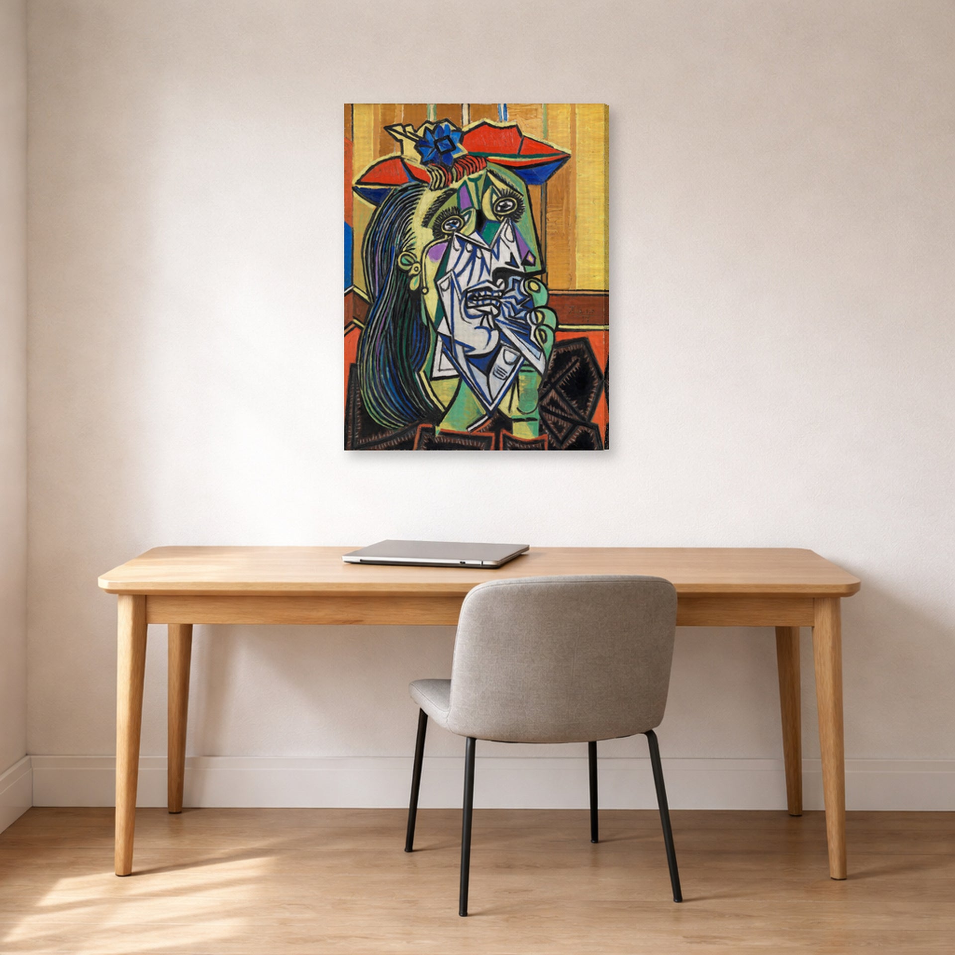 Gallery-wrapped canvas print of Pablo Picasso's 'Weeping Woman' displayed on a wall in a home office