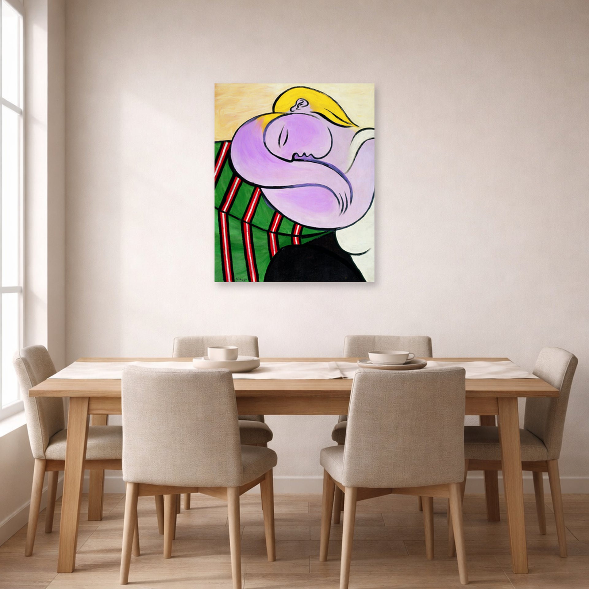 Unframed poster print of Pablo Picasso's 'Woman with Yellow Hair' displayed on a wall in a dining room