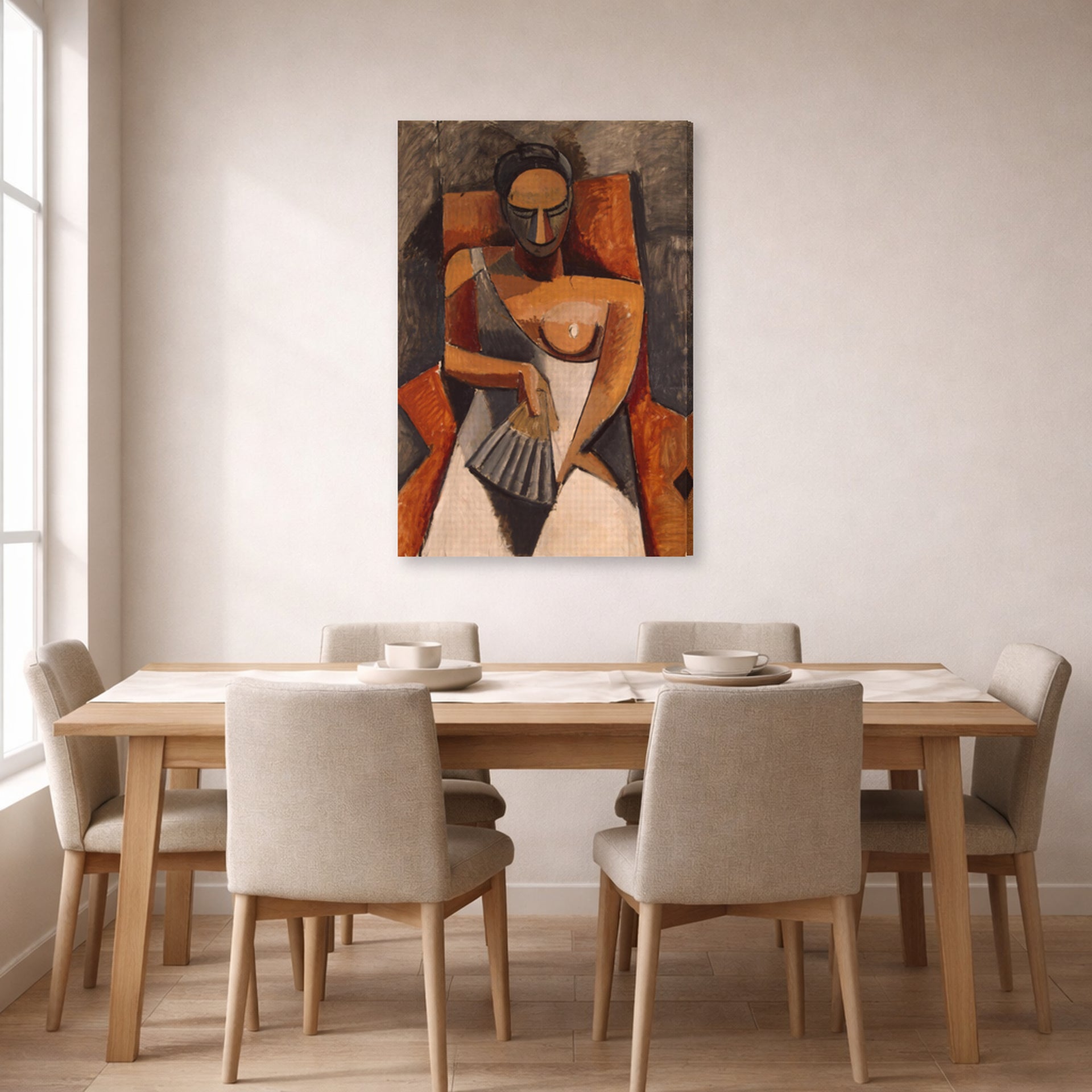 Gallery-wrapped canvas print of Pablo Picasso's 'Woman with a Fan' displayed on a wall in a dining room