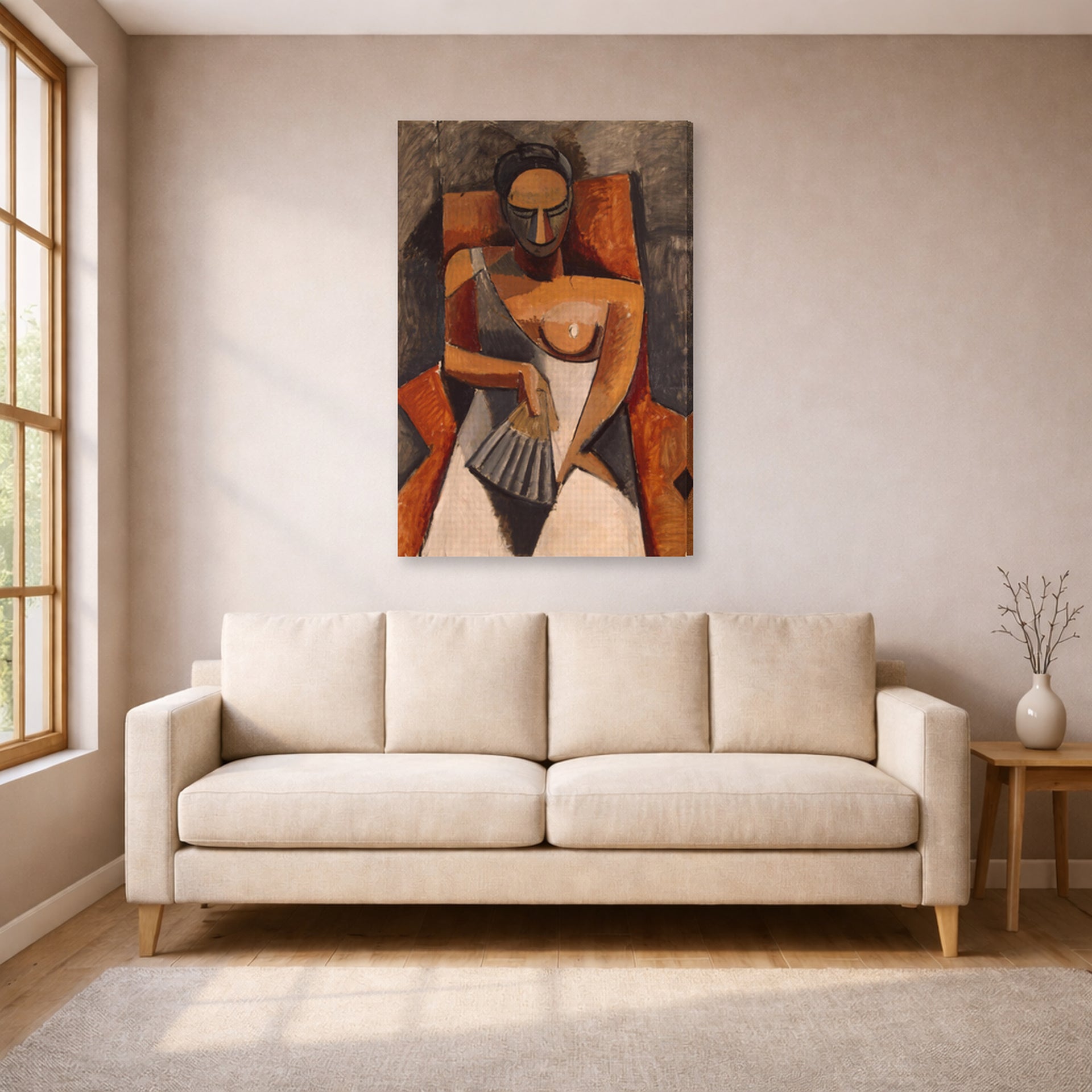 Gallery-wrapped canvas print of Pablo Picasso's 'Woman with a Fan' displayed on a wall in a living room
