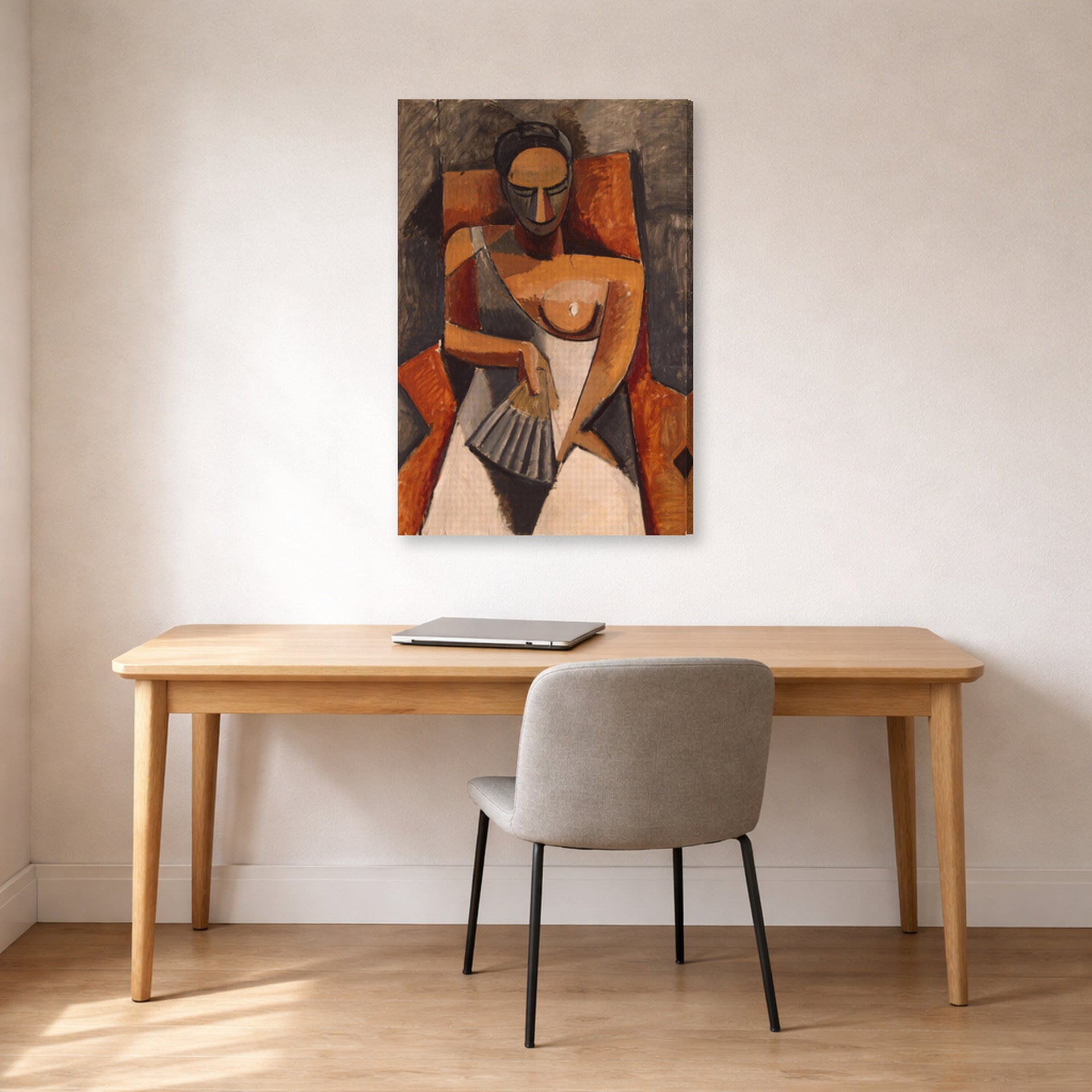 Gallery-wrapped canvas print of Pablo Picasso's 'Woman with a Fan' displayed on a wall in a home office