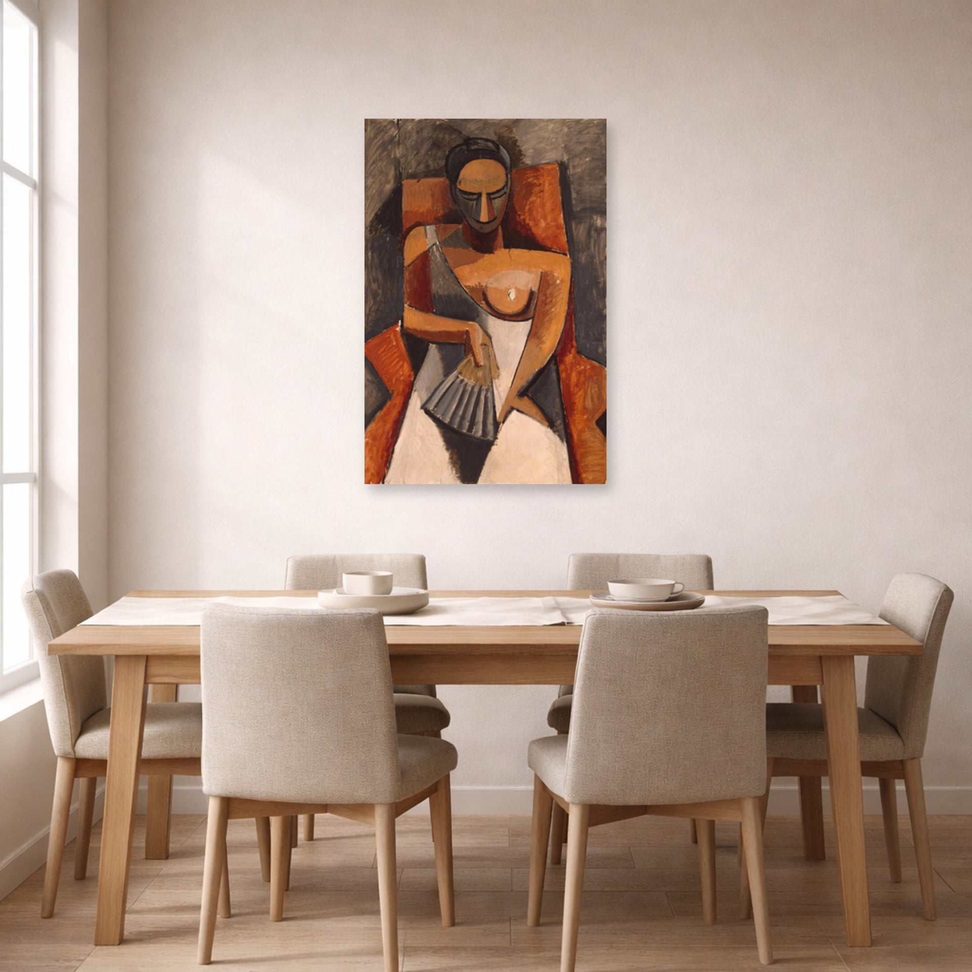 Unframed poster print of Pablo Picasso's 'Woman with a Fan' displayed on a wall in a dining room