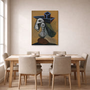 Gallery-wrapped canvas print of Pablo Picasso's 'Woman in a Blue Hat' displayed on a wall in a dining room