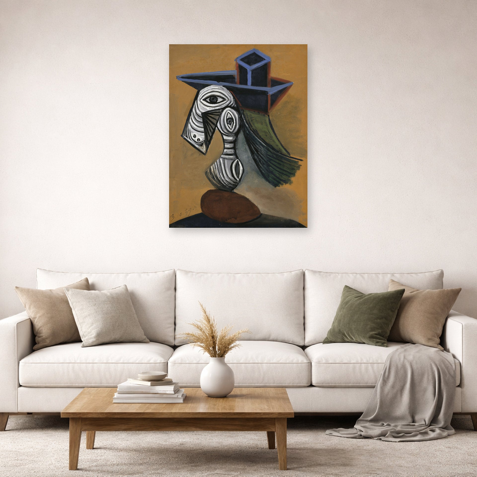 Unframed poster print of Pablo Picasso's 'Woman in a Blue Hat' displayed on a wall in a living room