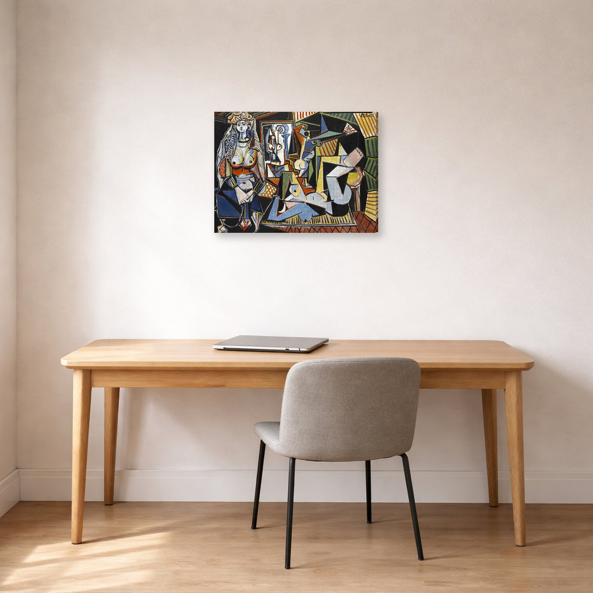 Gallery-wrapped canvas print of Pablo Picasso's 'Women of Algiers' displayed on a wall in a home office