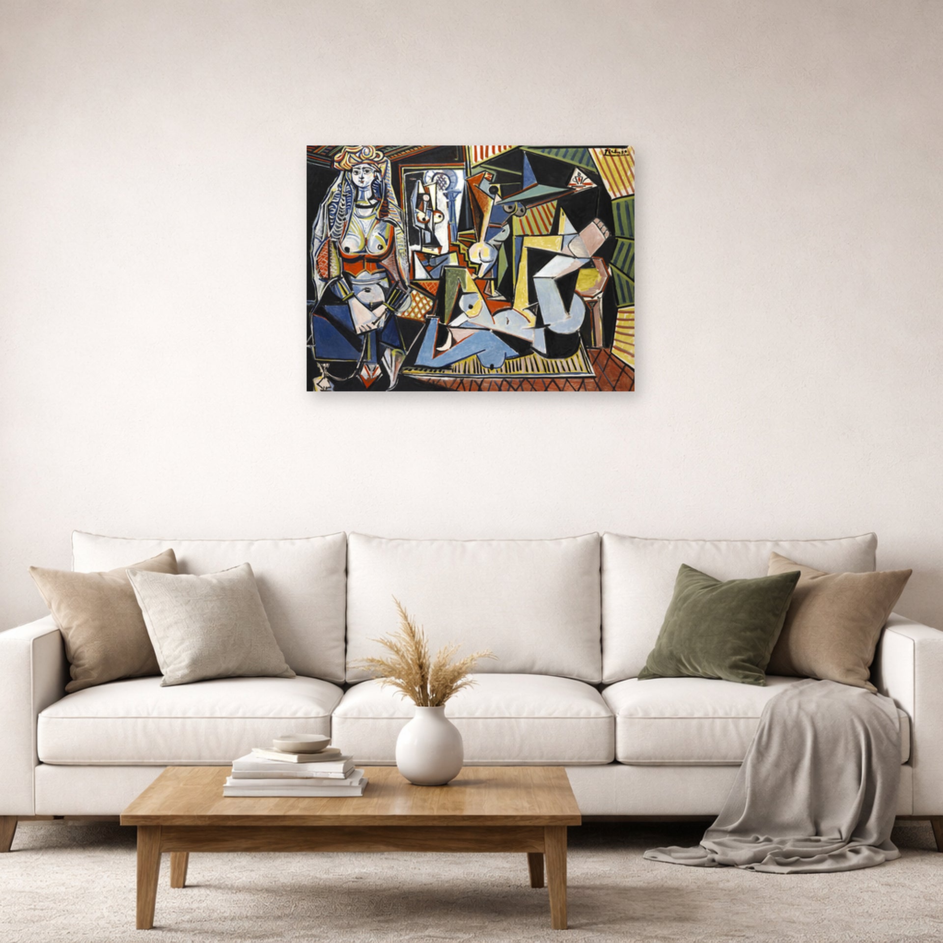 Unframed poster print of Pablo Picasso's 'Women of Algiers' displayed on a wall in a living room