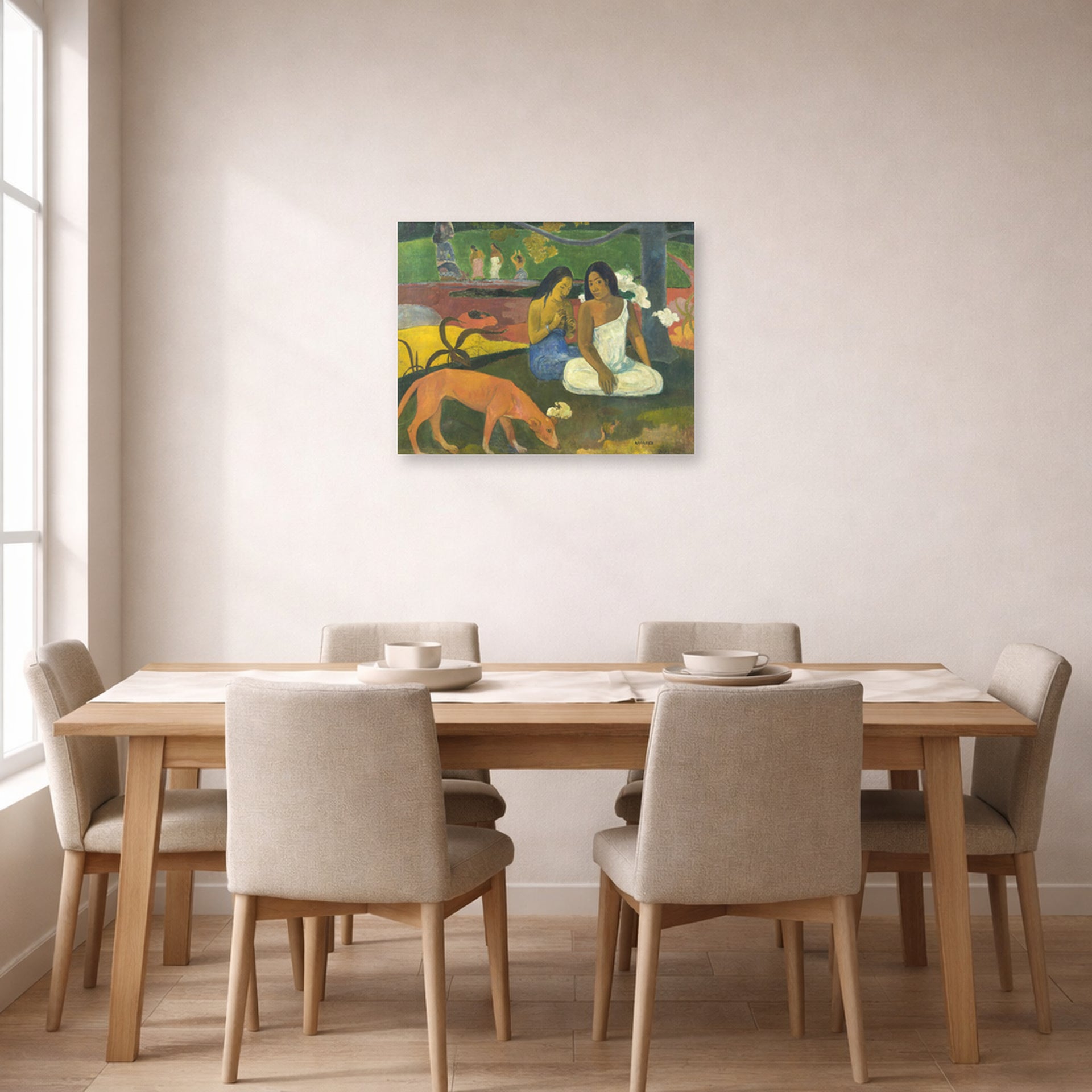 Unframed poster print of Paul Gauguin's Arearea displayed on a wall in a dining room