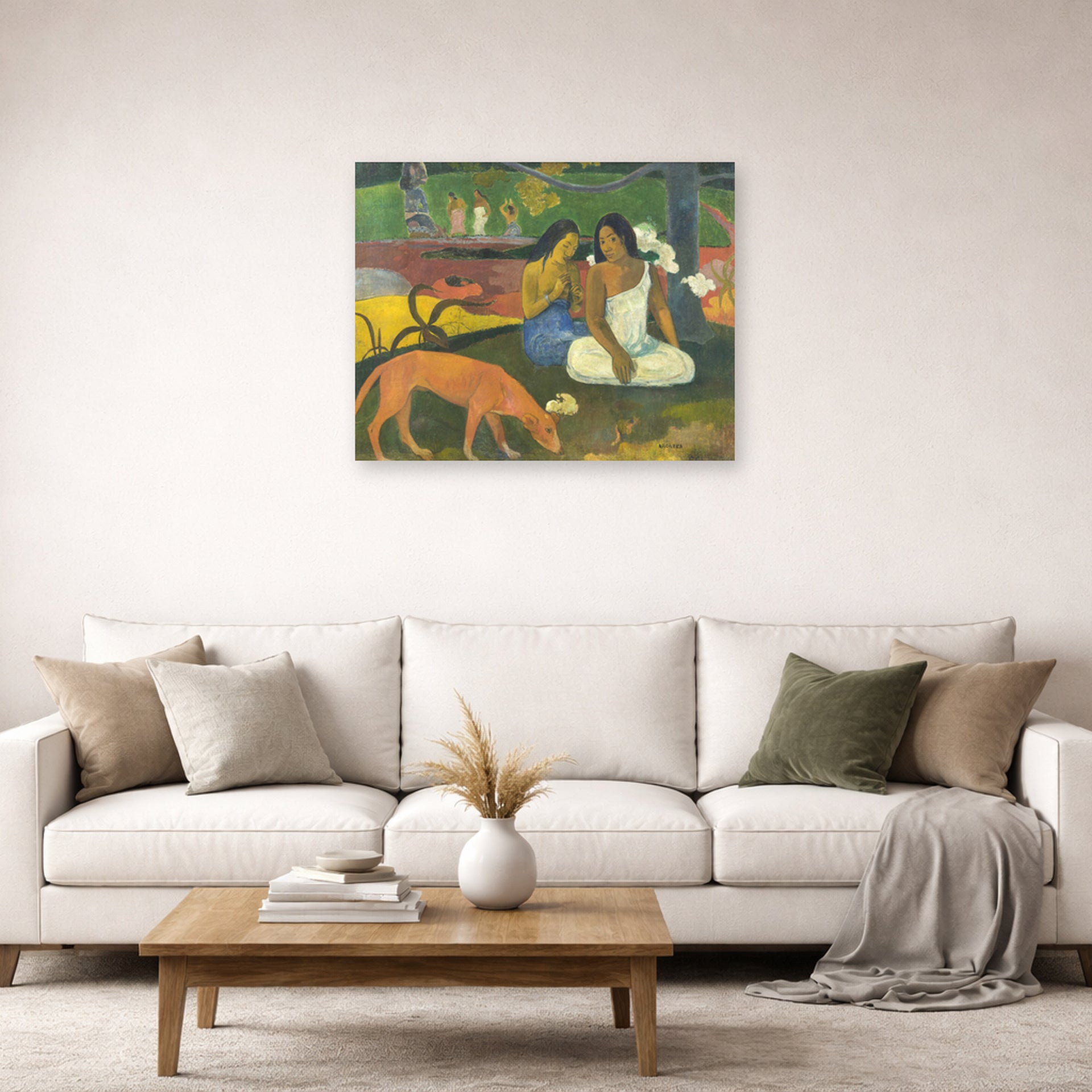Unframed poster print of Paul Gauguin's Arearea displayed on a wall in a second living room setting