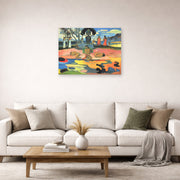 Unframed poster print of Paul Gauguin's Day of the God (Mahana no Atua) displayed on a wall in a second living room setting