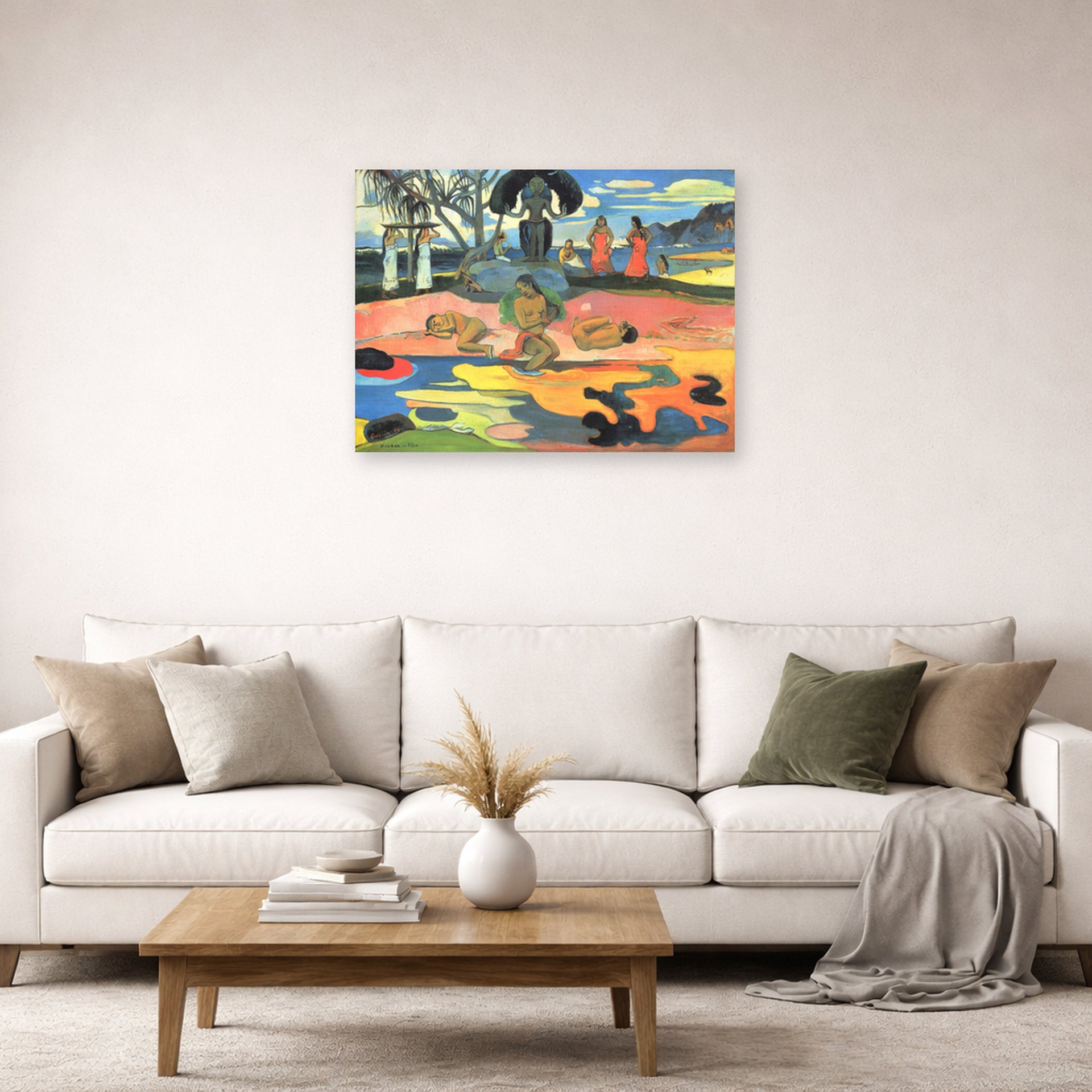 Unframed poster print of Paul Gauguin's Day of the God (Mahana no Atua) displayed on a wall in a second living room setting