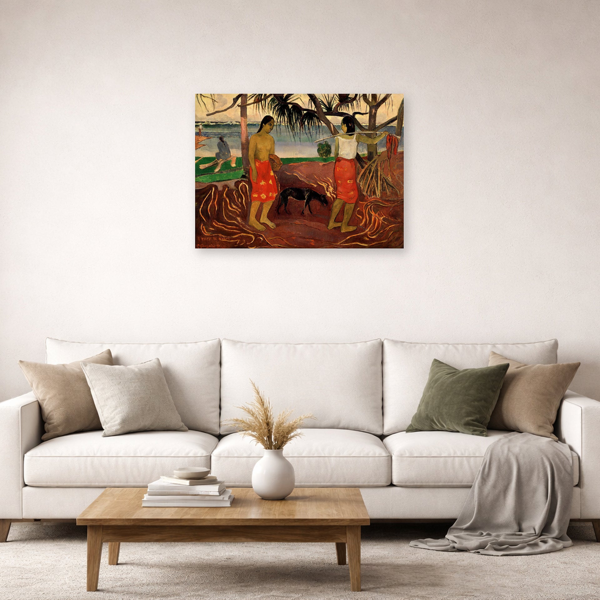 Unframed poster print of Paul Gauguin's I Raro te Oviri displayed on a wall in a second living room setting
