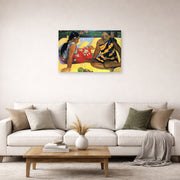 Unframed poster print of Paul Gauguin's Tahitian Women on the Beach displayed on a wall in a second living room setting