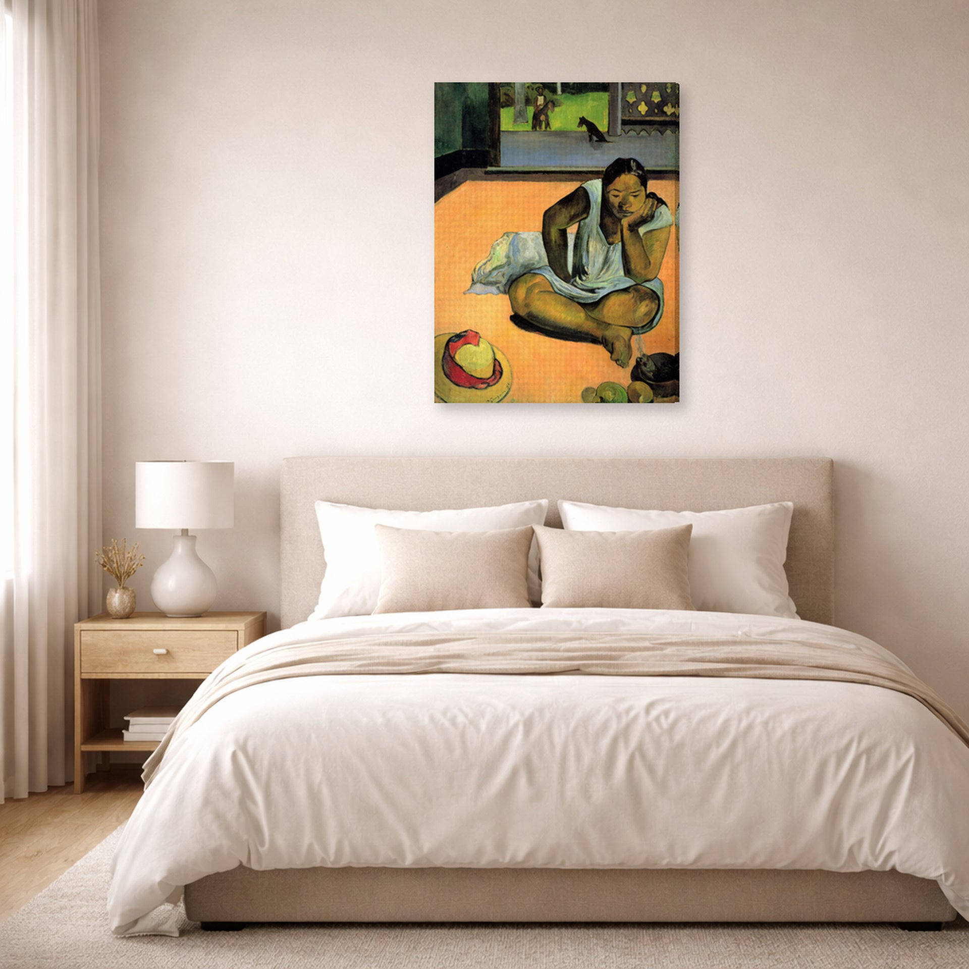 Gallery-wrapped canvas print of Paul Gauguin's The Brooding Woman displayed on a wall in a bedroom