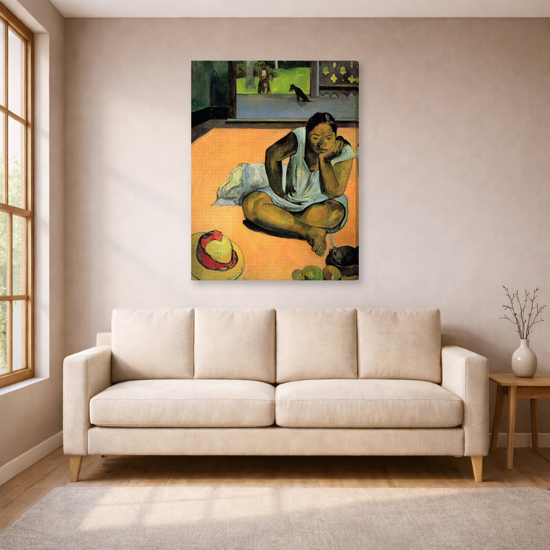 Gallery-wrapped canvas print of Paul Gauguin's The Brooding Woman displayed on a wall in a living room