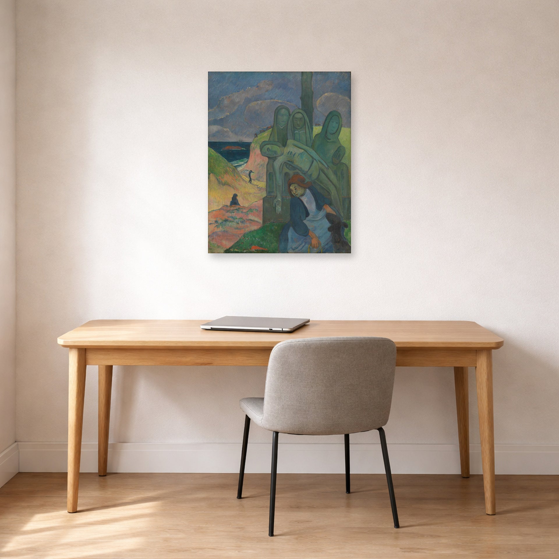 Unframed poster print of Paul Gauguin's The Green Christ displayed on a wall in an office