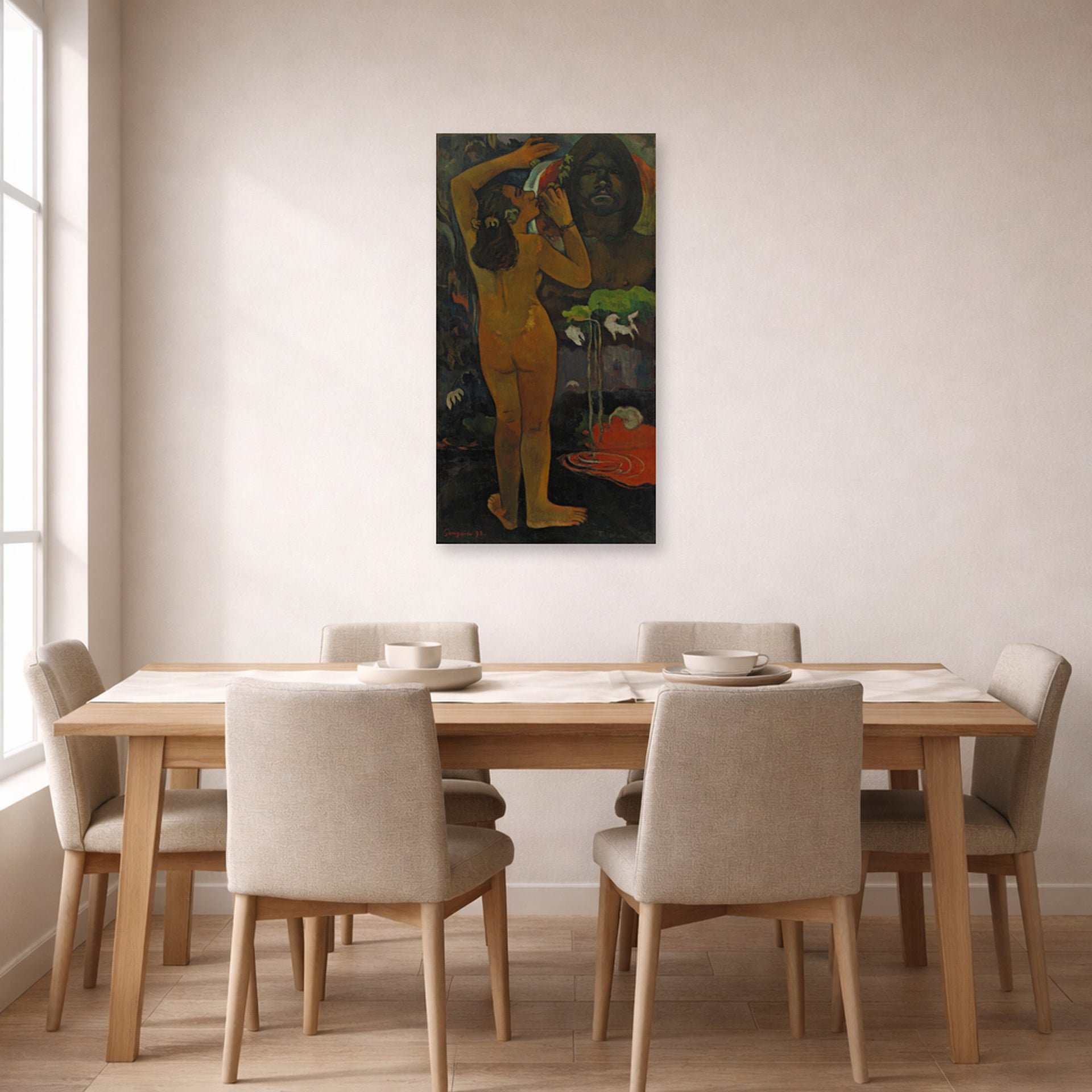 Unframed poster print of Paul Gauguin's The Moon and the Earth displayed on a wall in a dining room