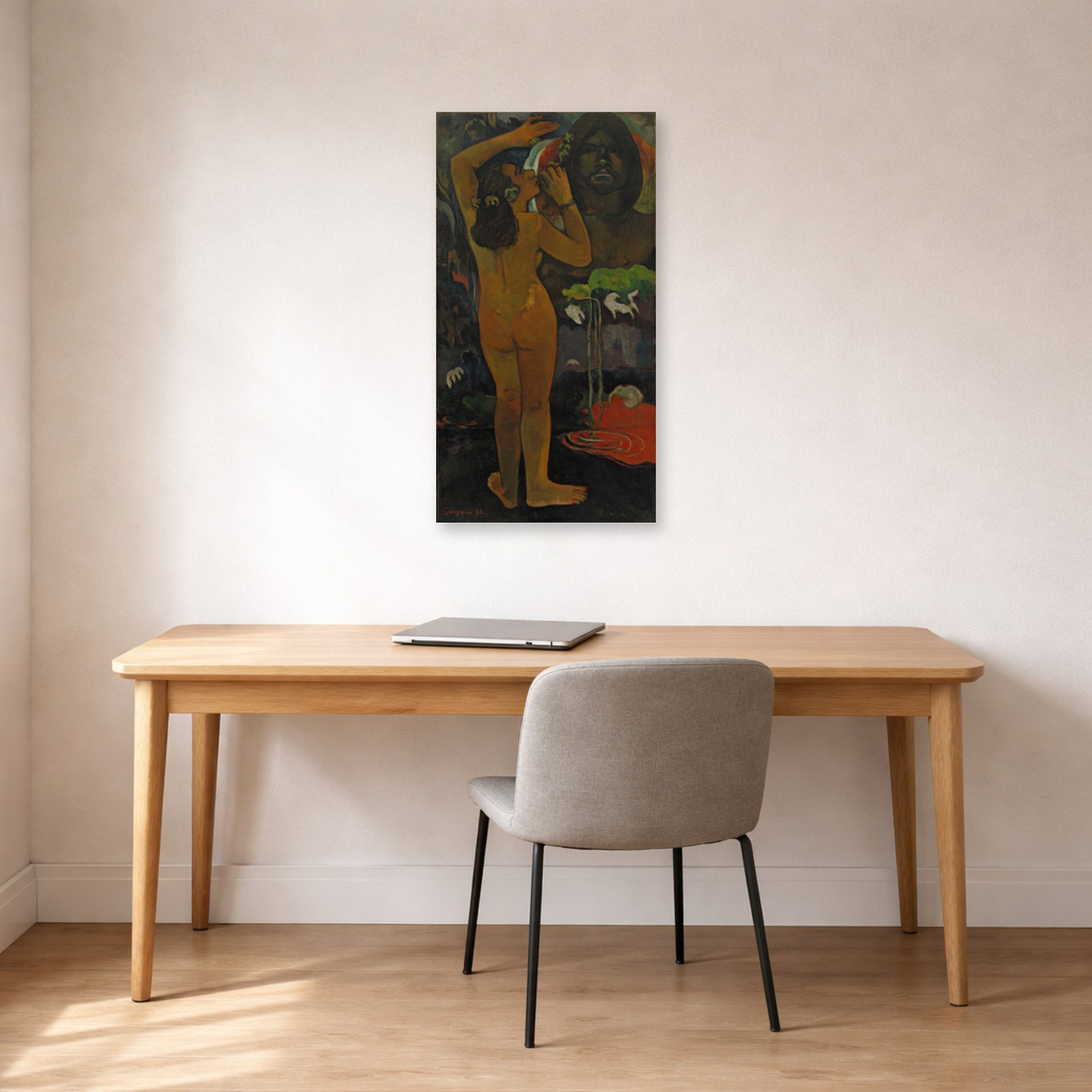 Unframed poster print of Paul Gauguin's The Moon and the Earth displayed on a wall in an office
