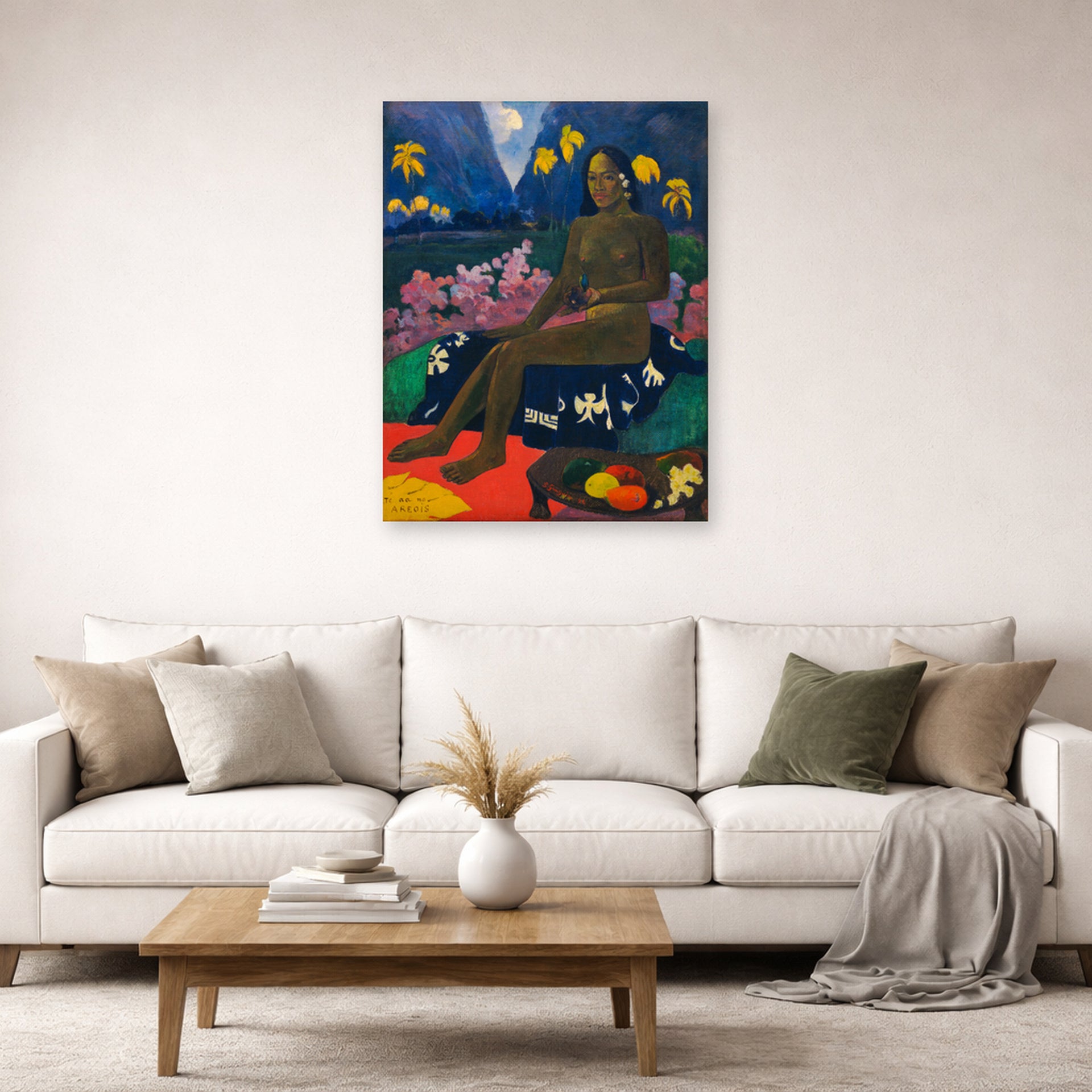 Unframed poster print of Paul Gauguin's The Seed of the Areoi displayed on a wall in a second living room setting