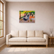 Unframed poster print of Paul Gauguin's The Siesta displayed on a wall in a living room