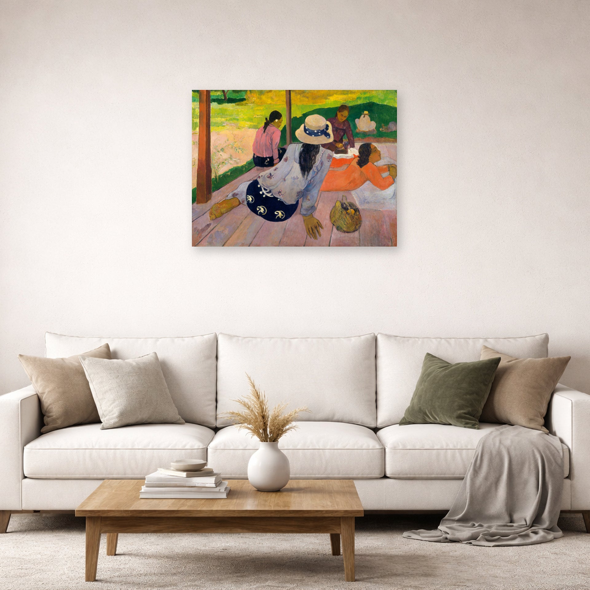 Unframed poster print of Paul Gauguin's The Siesta displayed on a wall in a second living room setting