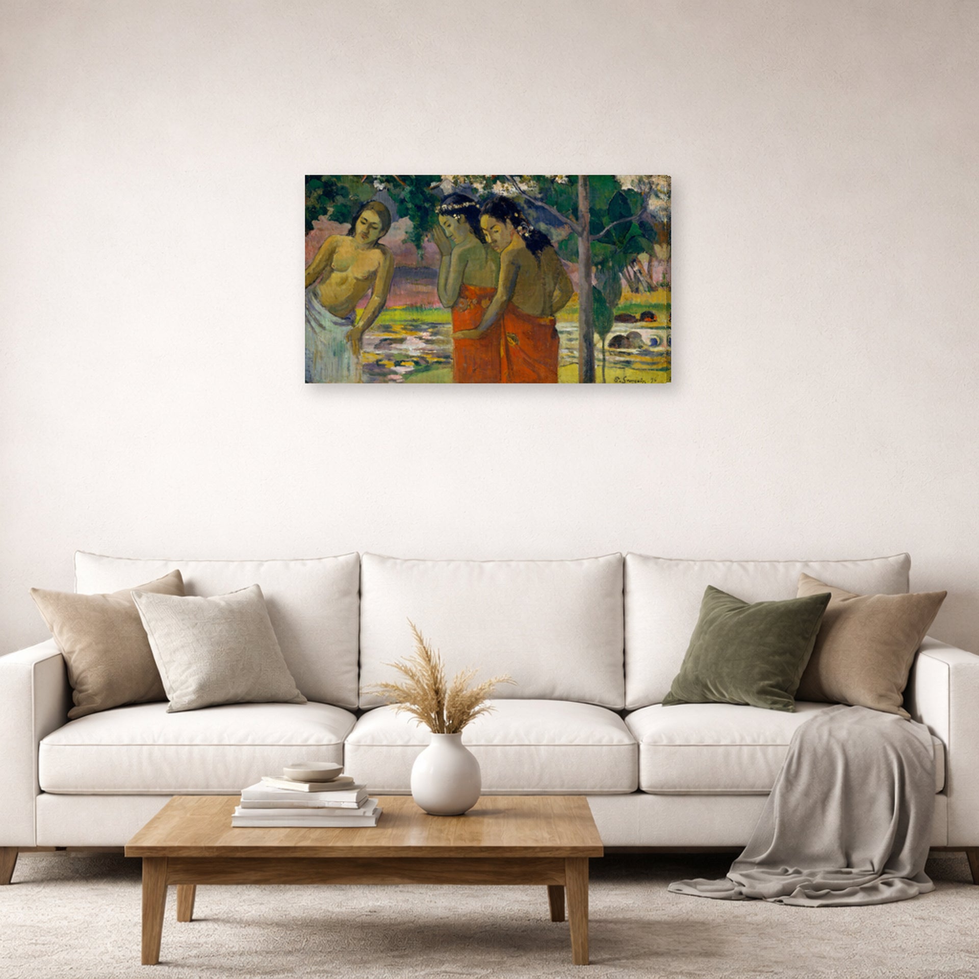 Gallery-wrapped canvas print of Paul Gauguin's Three Tahitian Women displayed on a wall in a second living room setting