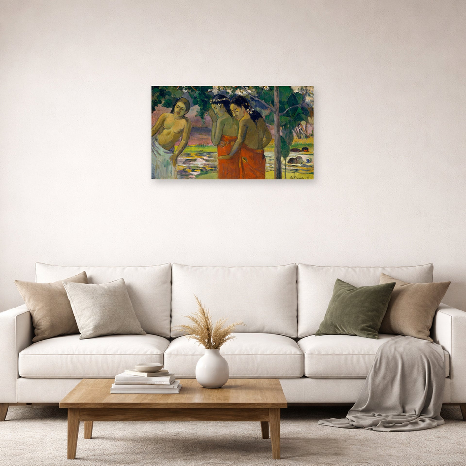 Unframed poster print of Paul Gauguin's Three Tahitian Women displayed on a wall in a second living room setting