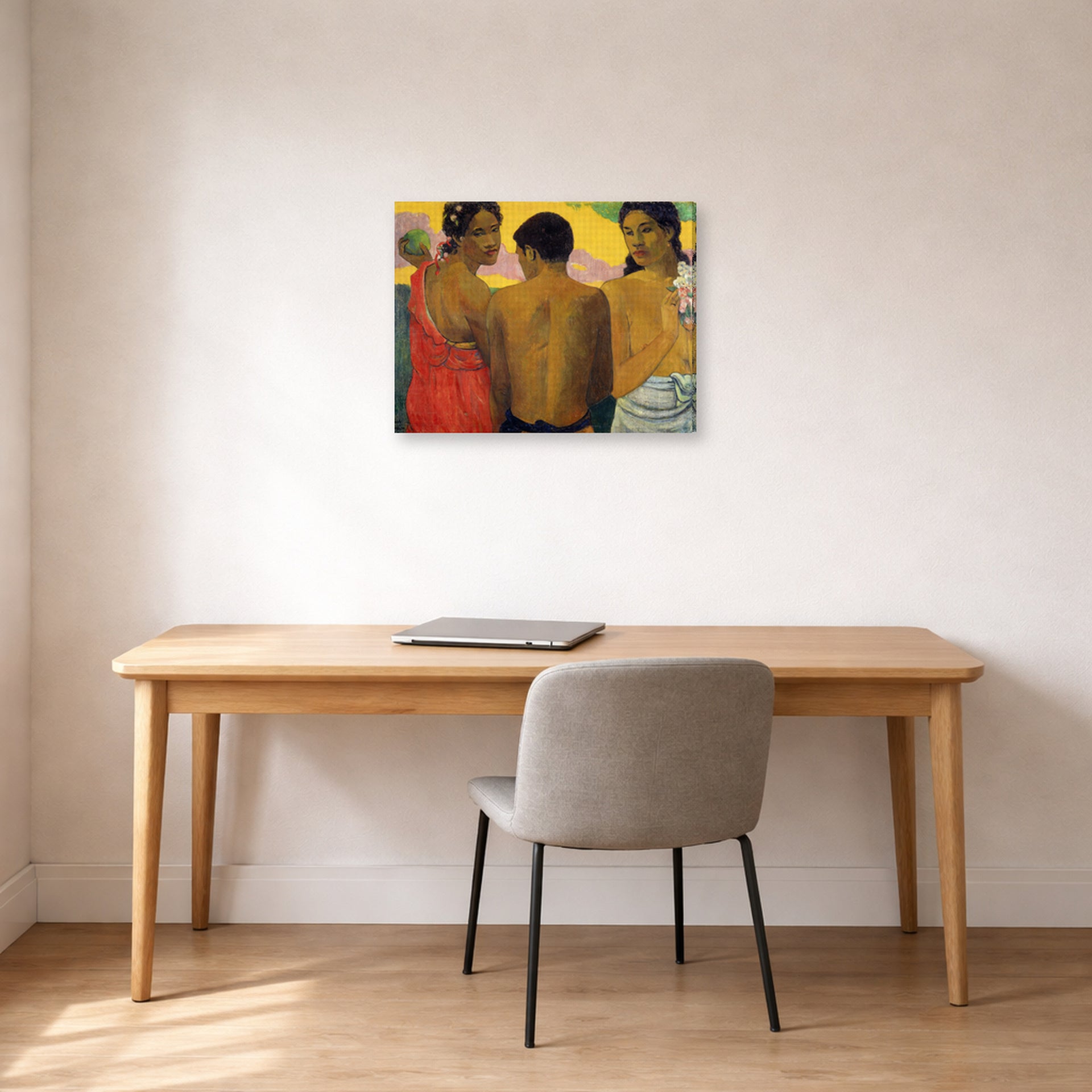 Gallery-wrapped canvas print of Paul Gauguin's Three Tahitians displayed on a wall in an office