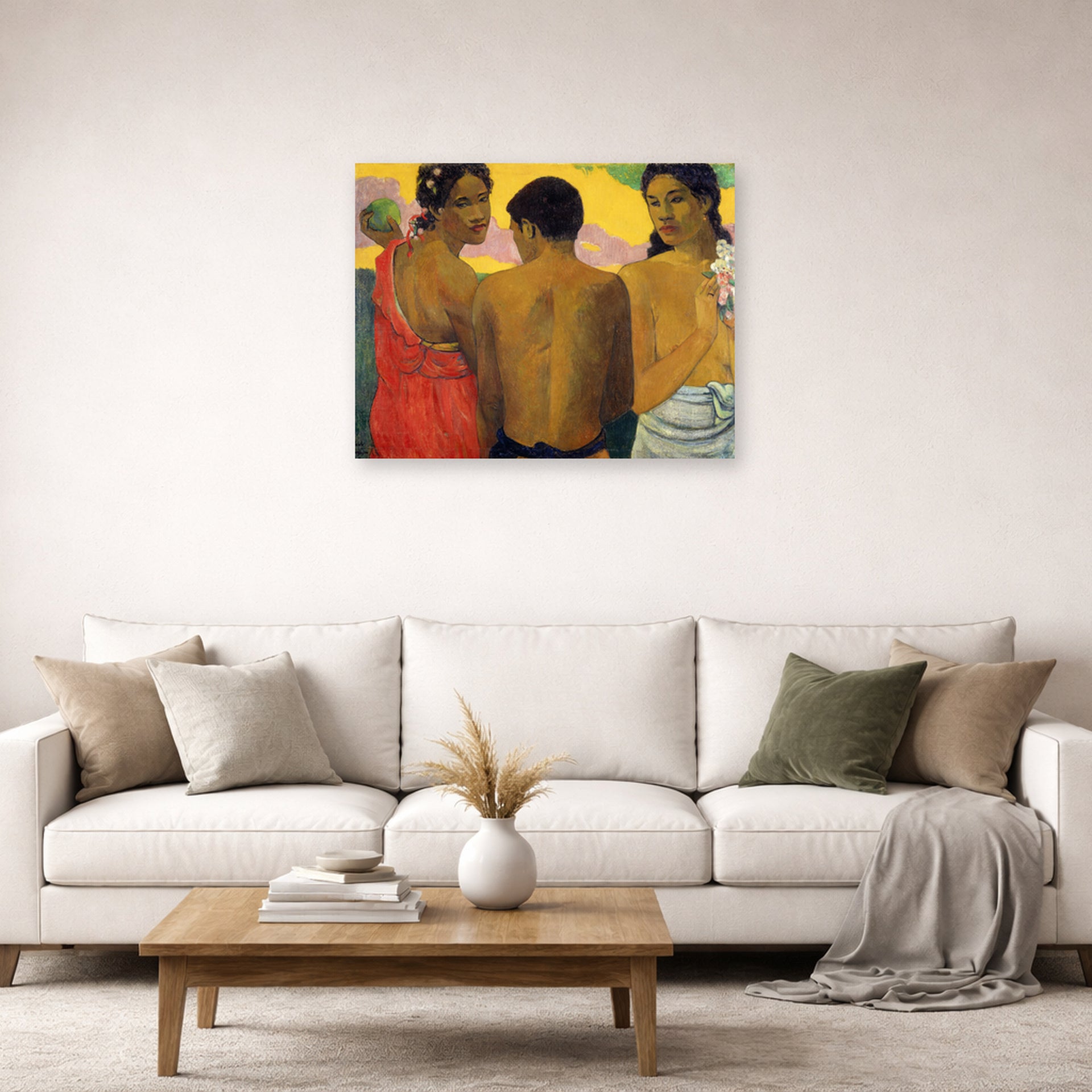 Unframed poster print of Paul Gauguin's Three Tahitians displayed on a wall in a second living room setting