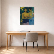 Unframed poster print of Paul Gauguin's Two Tahitian Women displayed on a wall in an office