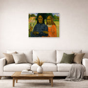 Unframed poster print of Paul Gauguin's Two Women displayed on a wall in a second living room setting