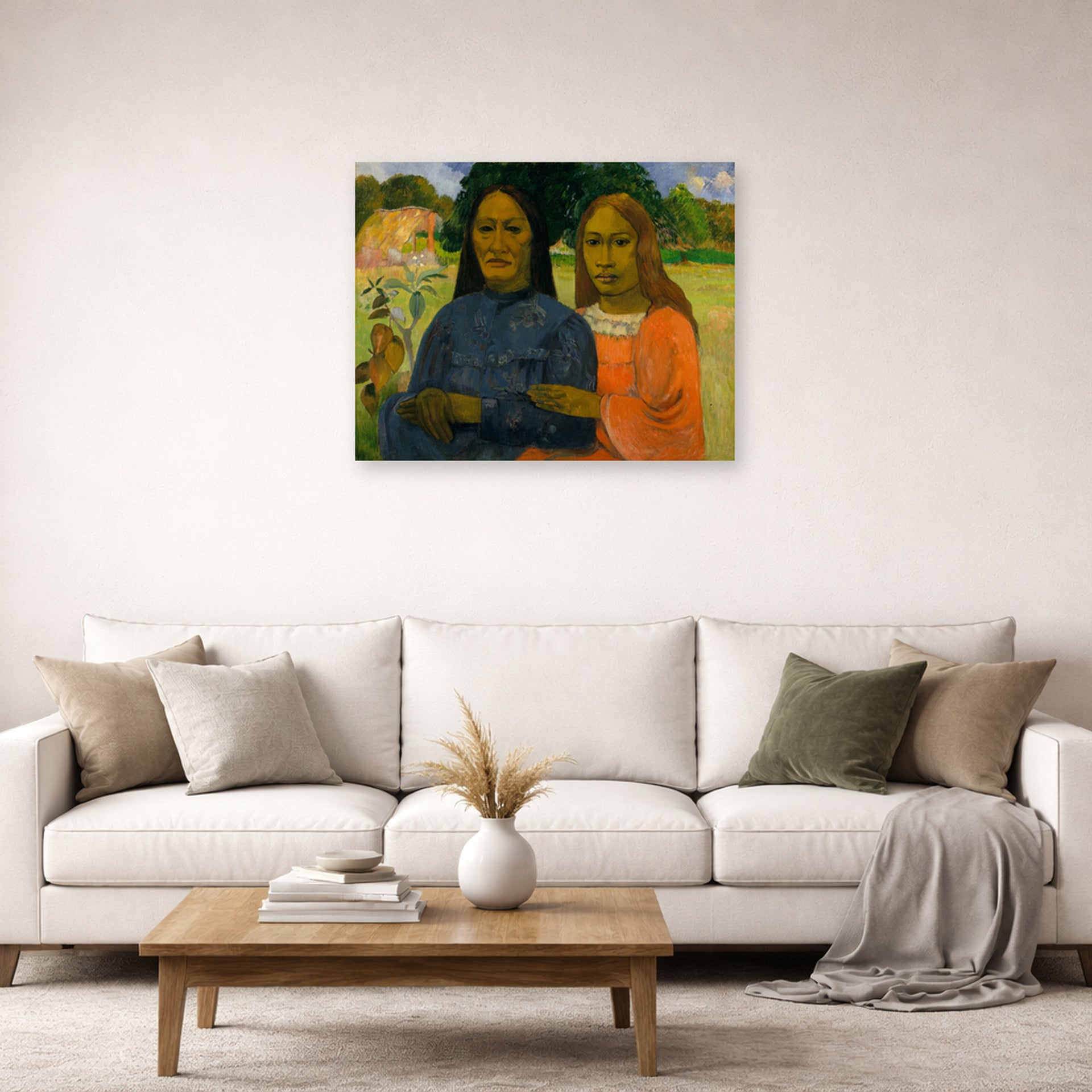 Unframed poster print of Paul Gauguin's Two Women displayed on a wall in a second living room setting